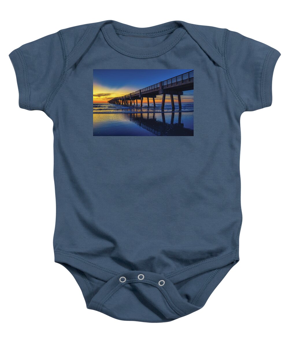 Jacksonville Beach Baby Onesie featuring the photograph Golden Sunrise Reflection at the Jacksonville Beach Pier by Kim Seng