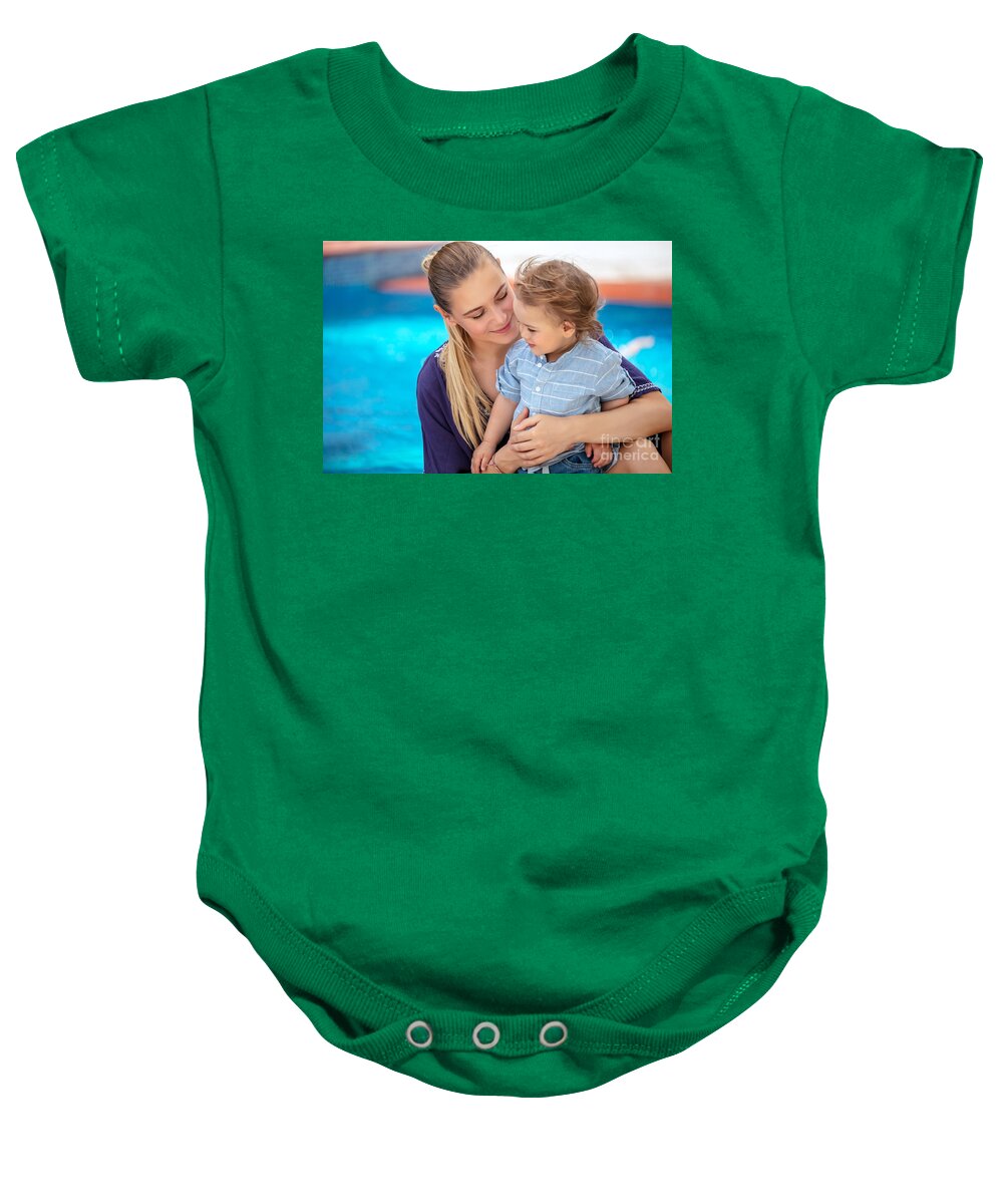 Activity Baby Onesie featuring the photograph Baby boy with mom on the beach resort by Anna Om