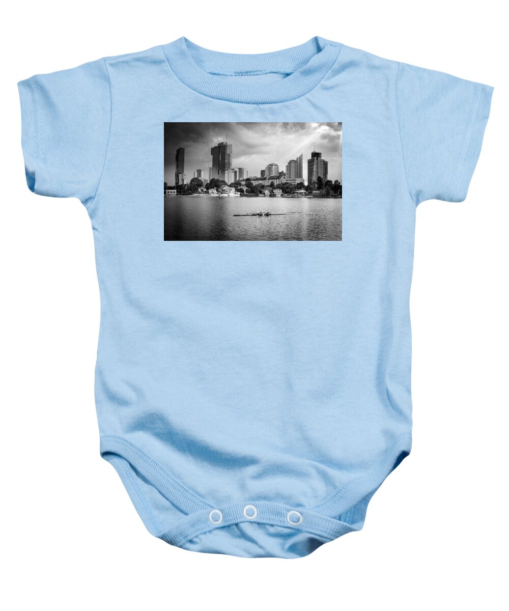 Skyline Baby Onesie featuring the photograph Rowing Boat And The Skyline Of Vienna by Andreas Berthold