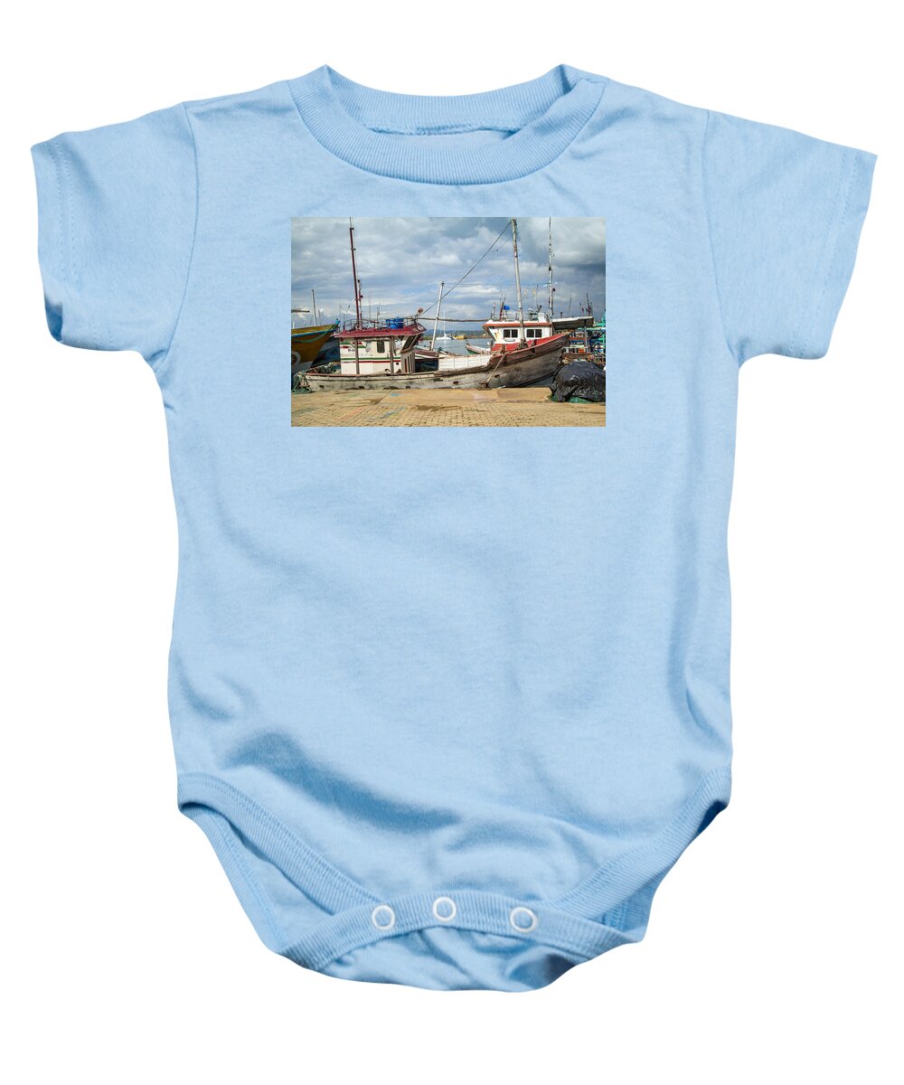 Harbor Baby Onesie featuring the photograph boats in the harbour of Mirissa on the tropical island of Sri Lanka by Gina Koch