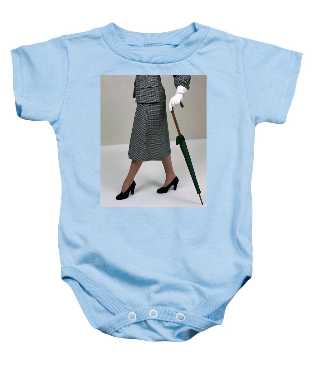 Accessories Baby Onesie featuring the photograph A Model Holding An Umbrella by Serge Balkin