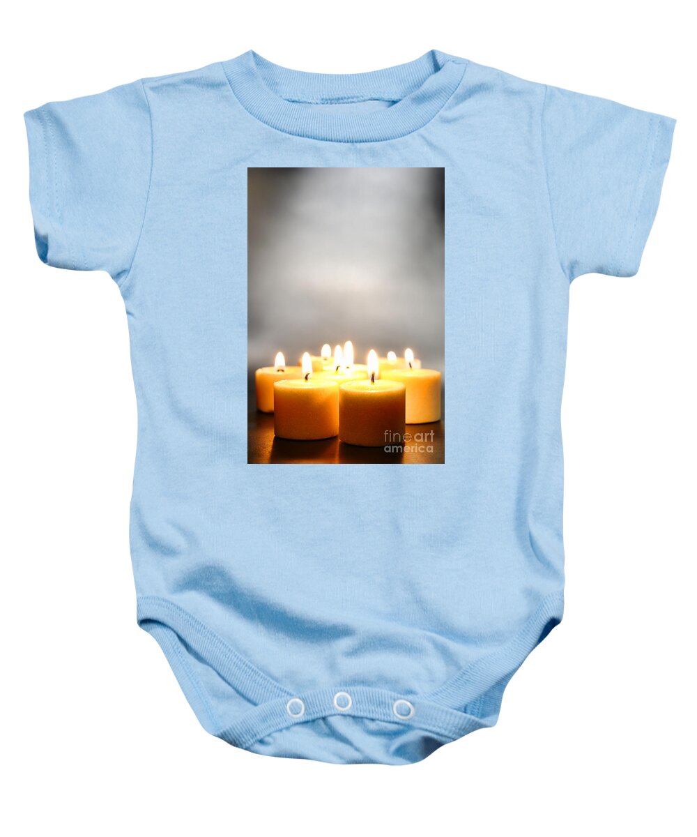 Votive Baby Onesie featuring the photograph Glow and Smoke by Olivier Le Queinec