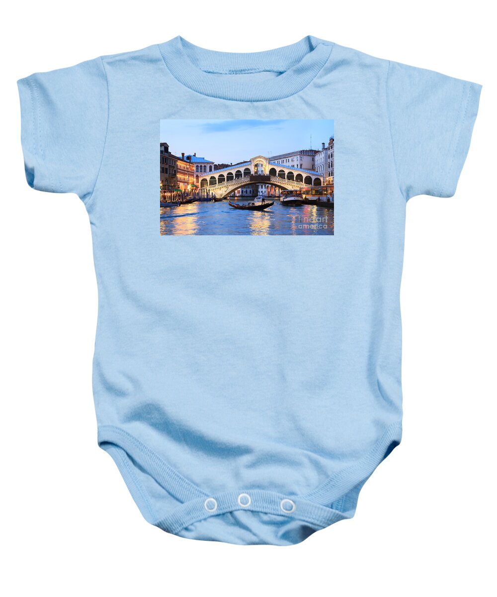 Venice Baby Onesie featuring the photograph Gondola in front of Rialto bridge at dusk Venice Italy by Matteo Colombo