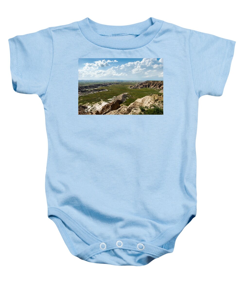 Dakota Baby Onesie featuring the photograph Overlooking Sheep Mountain Table by Greni Graph