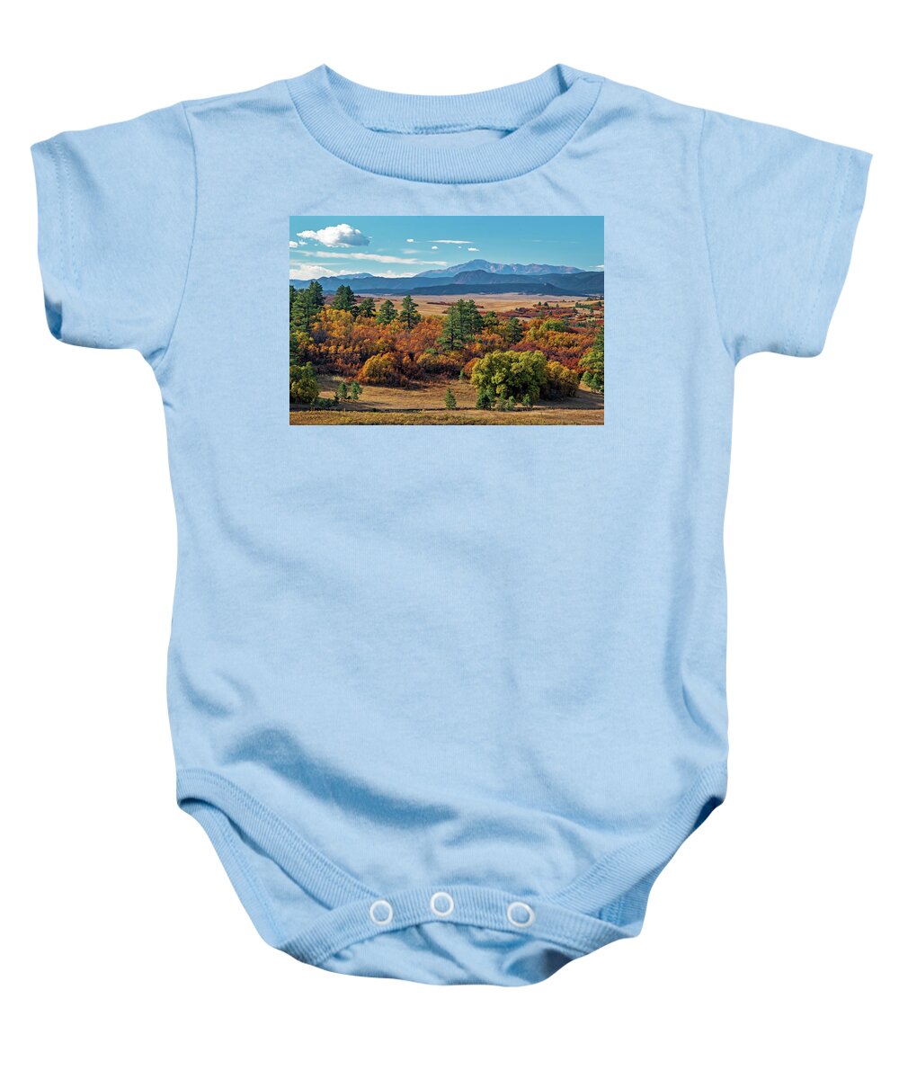 Colorado Baby Onesie featuring the photograph Pikes Peak Over Scrub Oak #1 by Dawn Key