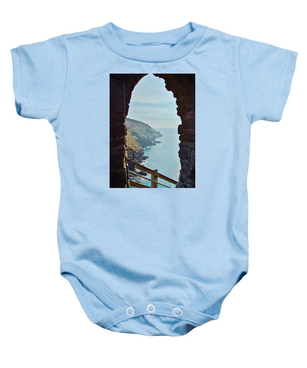 Tintagel Baby Onesie featuring the photograph A Room With A View by Richard Brookes