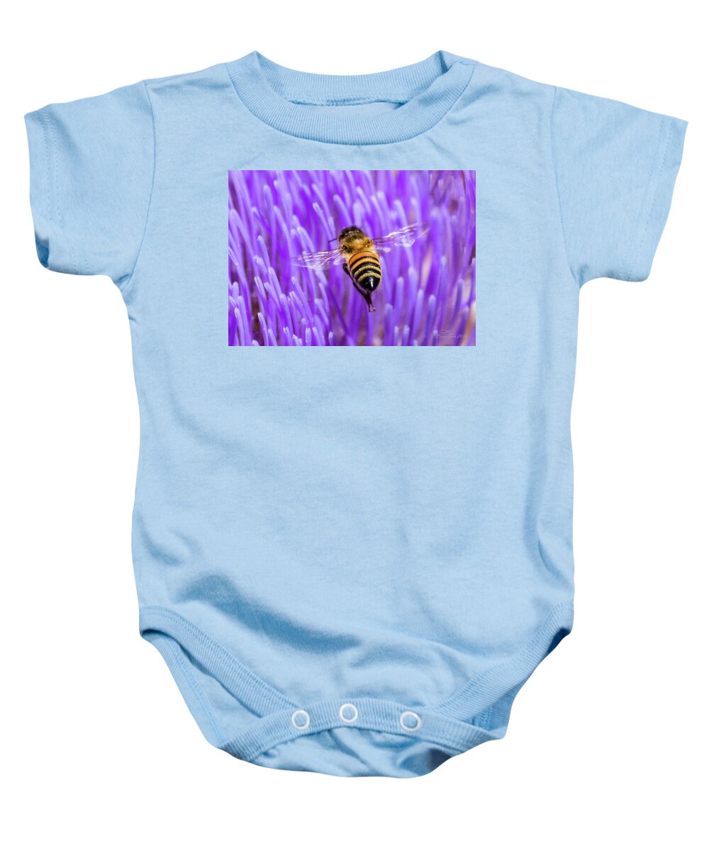 Bee Baby Onesie featuring the photograph Bee with Artichoke Bloom by Brian Tada