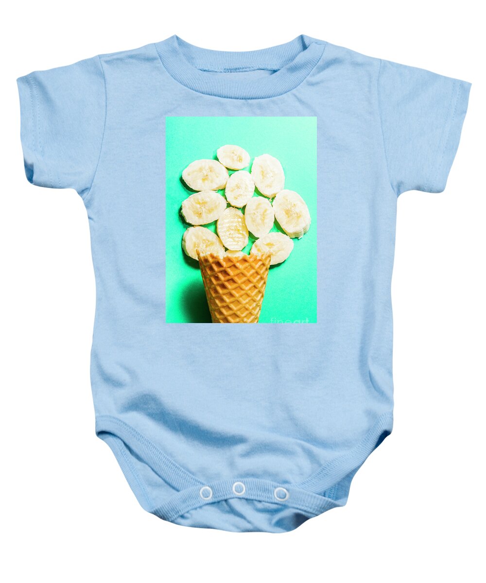 Banana Baby Onesie featuring the photograph Dessert concept of ice-cream cone and banana slices by Jorgo Photography