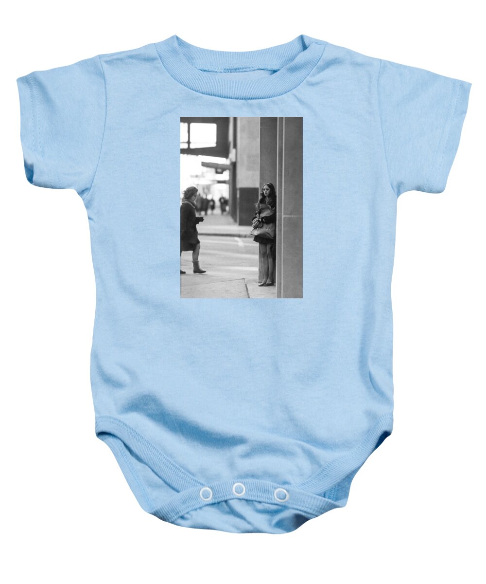 Actions Baby Onesie featuring the photograph I should have dressed warmer by Mike Evangelist