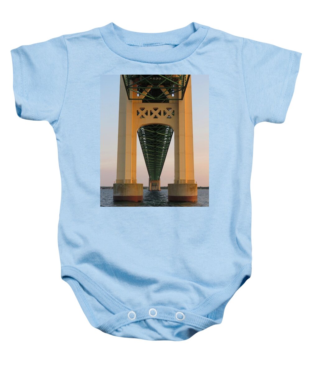 Mackinac Bridge Baby Onesie featuring the photograph Mackinac Bridge Tower at Sunset by Keith Stokes