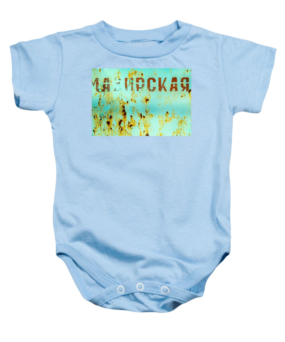 Rusted Metal Baby Onesie featuring the photograph Rust on Metal Russian Letters by John Williams
