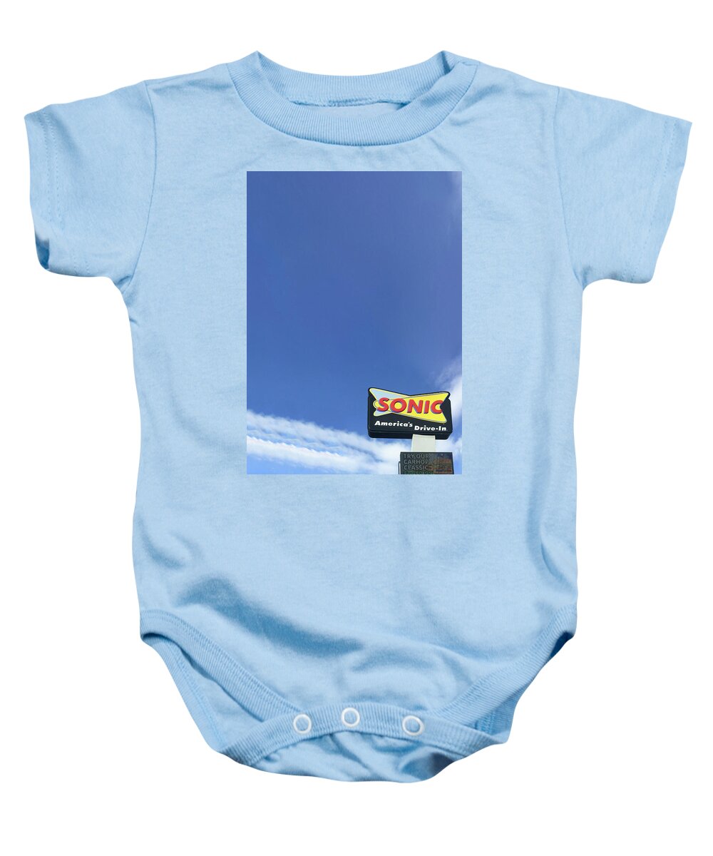 America's Baby Onesie featuring the photograph Sonic Americas Drive In Dark Blue Sky by Bert Peake