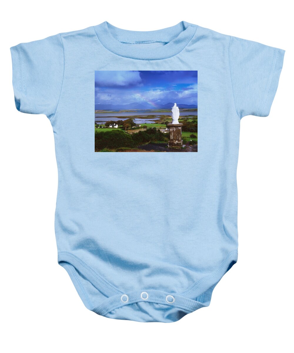 Co Mayo Baby Onesie featuring the photograph St Patricks Statue, Co Mayo, Ireland by The Irish Image Collection 