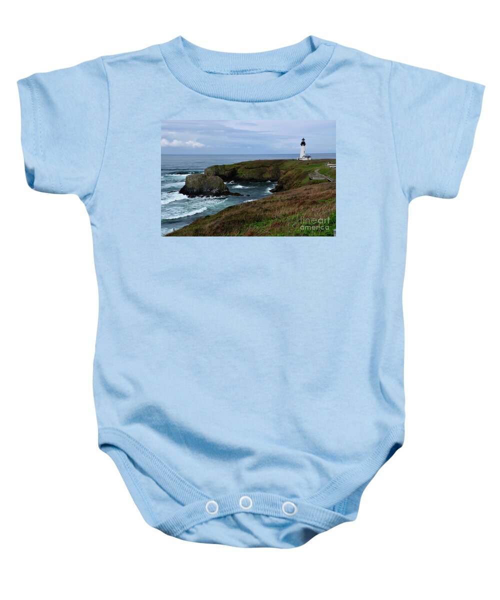 Denise Bruchman Baby Onesie featuring the photograph Stormy Yaquina Head Lighthouse by Denise Bruchman