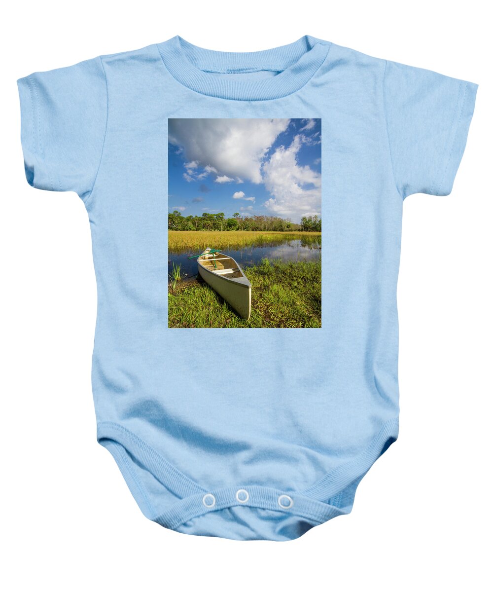 Boats Baby Onesie featuring the photograph White Canoe in the Glades by Debra and Dave Vanderlaan