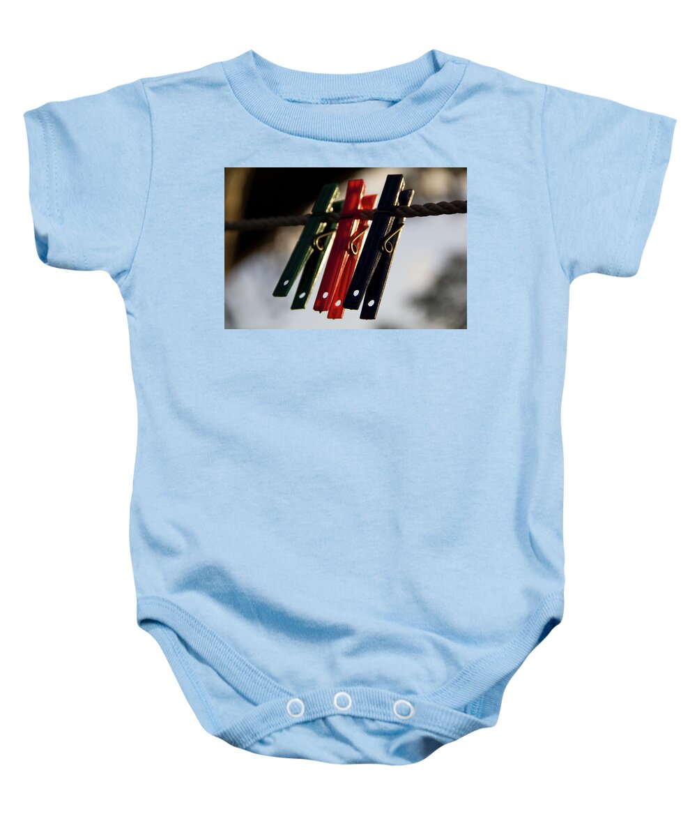 Clothes Pegs Baby Onesie featuring the photograph Jobless by Stuart Manning