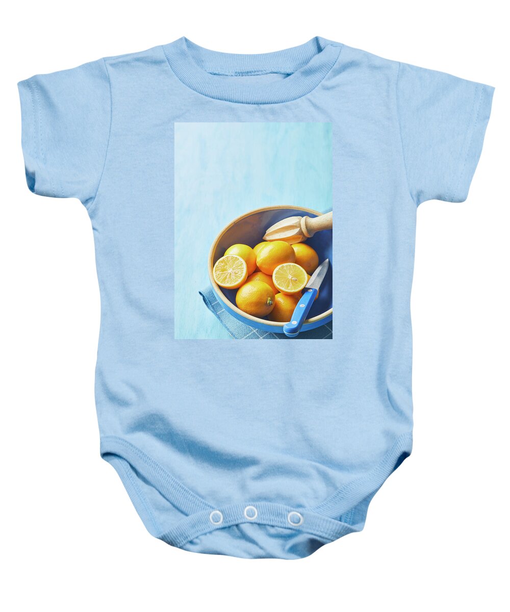 Lemons Baby Onesie featuring the photograph Lemons in a blue bowl by Cuisine at Home