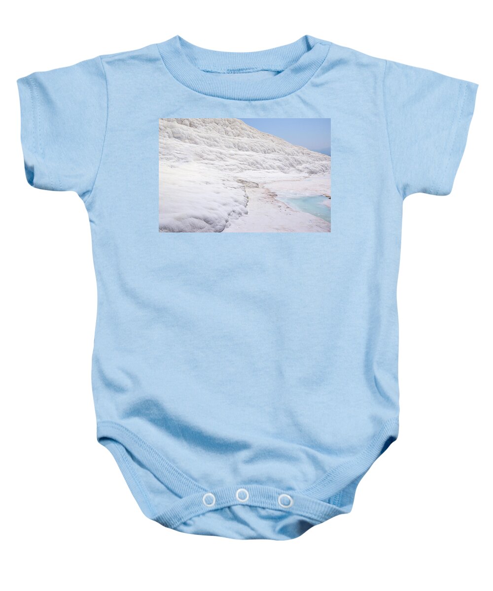 Turkey Baby Onesie featuring the photograph Limestone formations in Pamukkale by Sun Travels