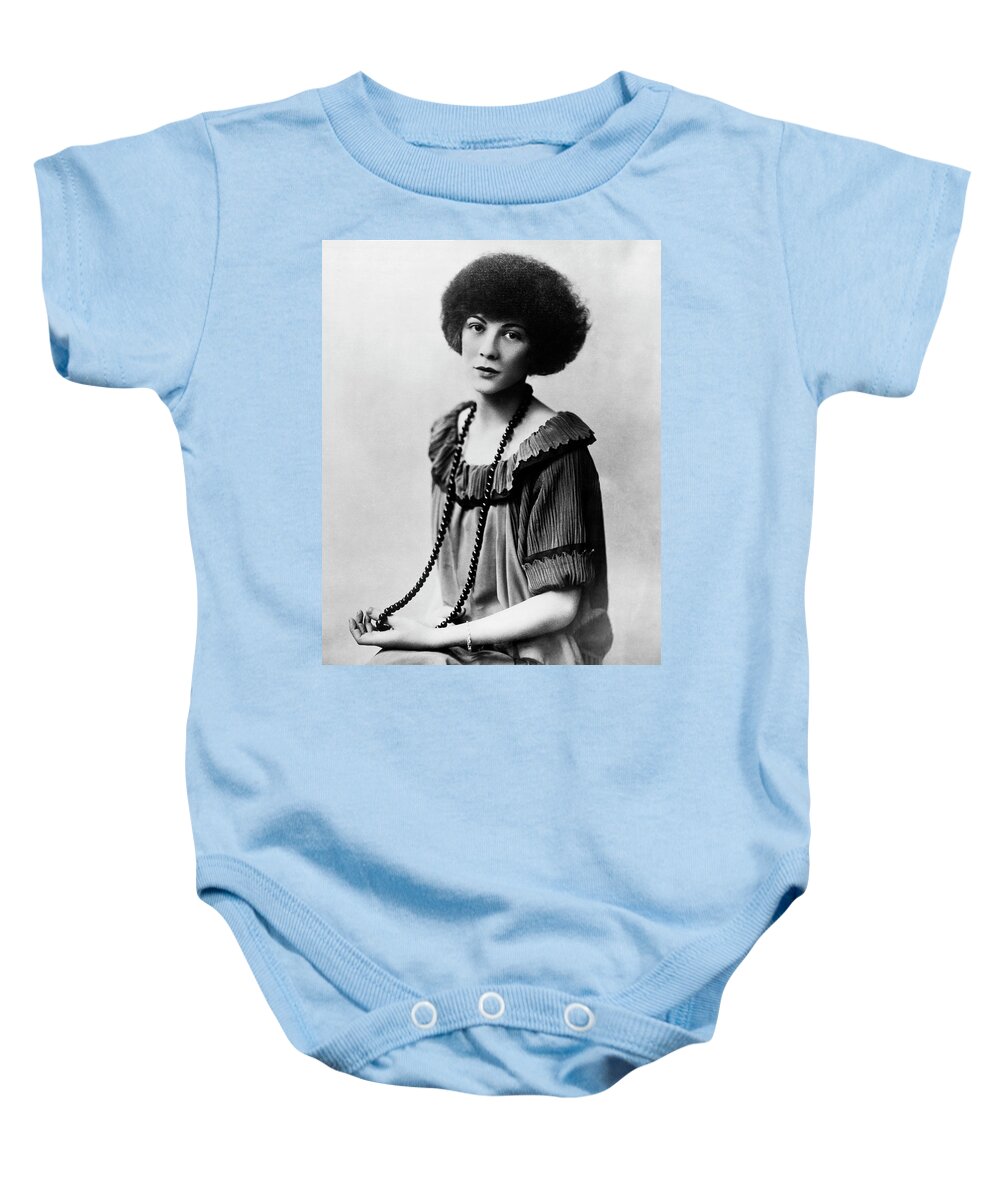 1 Person Baby Onesie featuring the photograph Portrait Of Young Woman by Underwood Archives