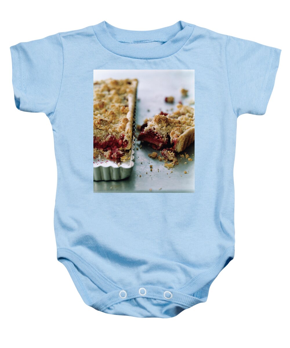 #new2022 Baby Onesie featuring the photograph Raspberry Crumble Tart by Romulo Yanes