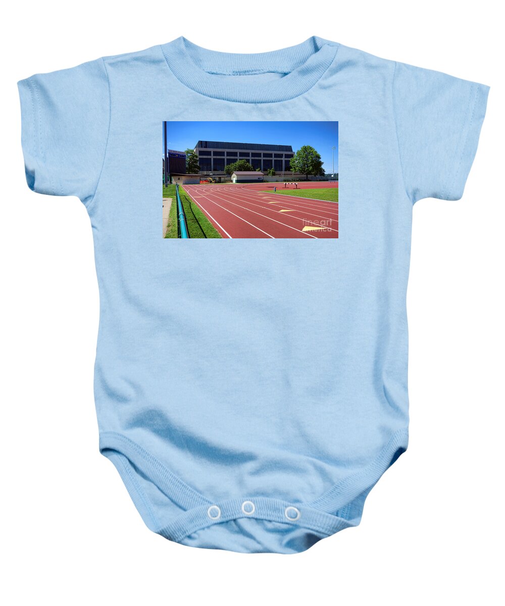 Usna Baby Onesie featuring the photograph USNA Ingram Field and Rickover Hall by Olivier Le Queinec