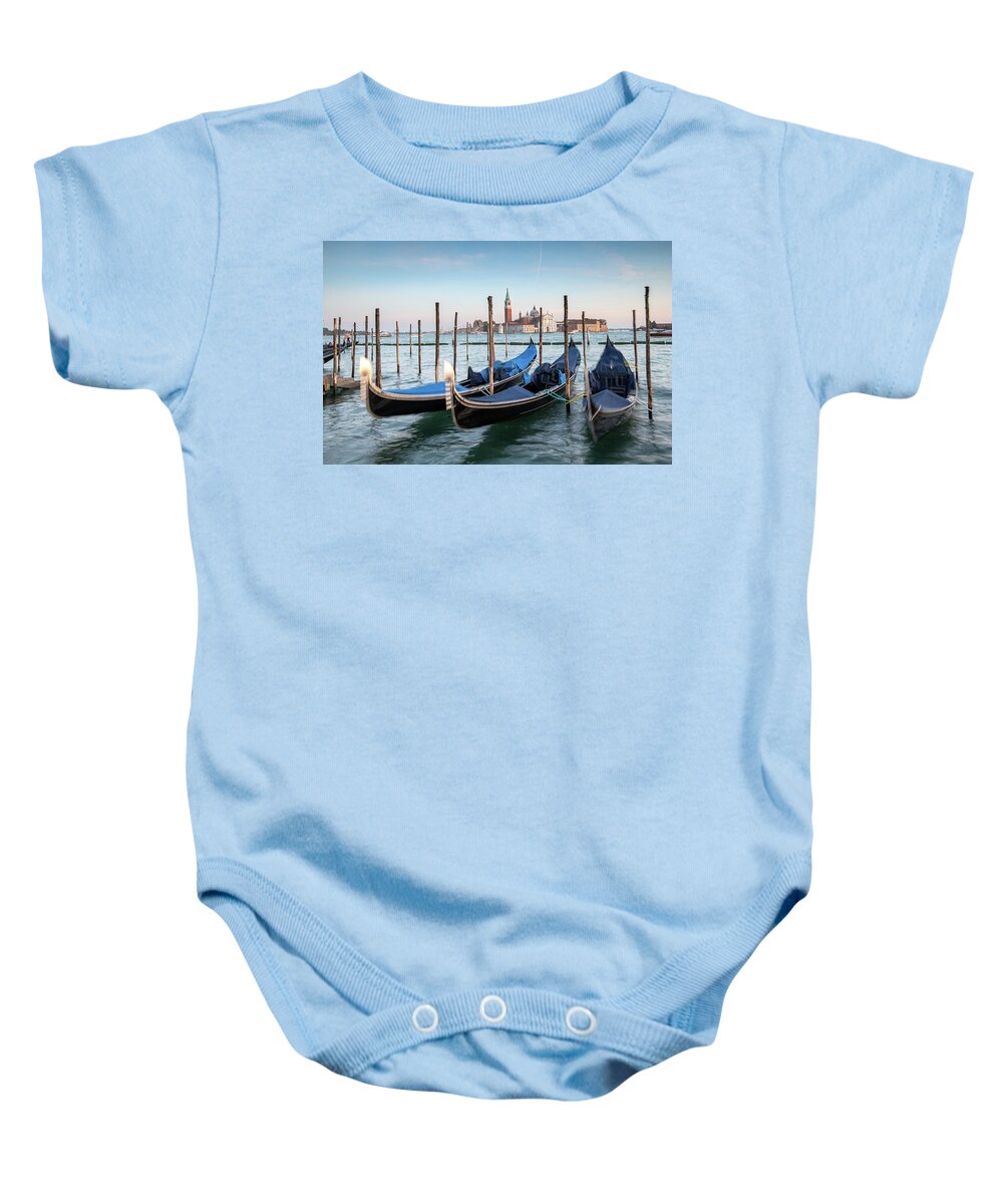 Gondola Baby Onesie featuring the photograph Venice Gondolas moored at the San Marco square. #2 by Michalakis Ppalis