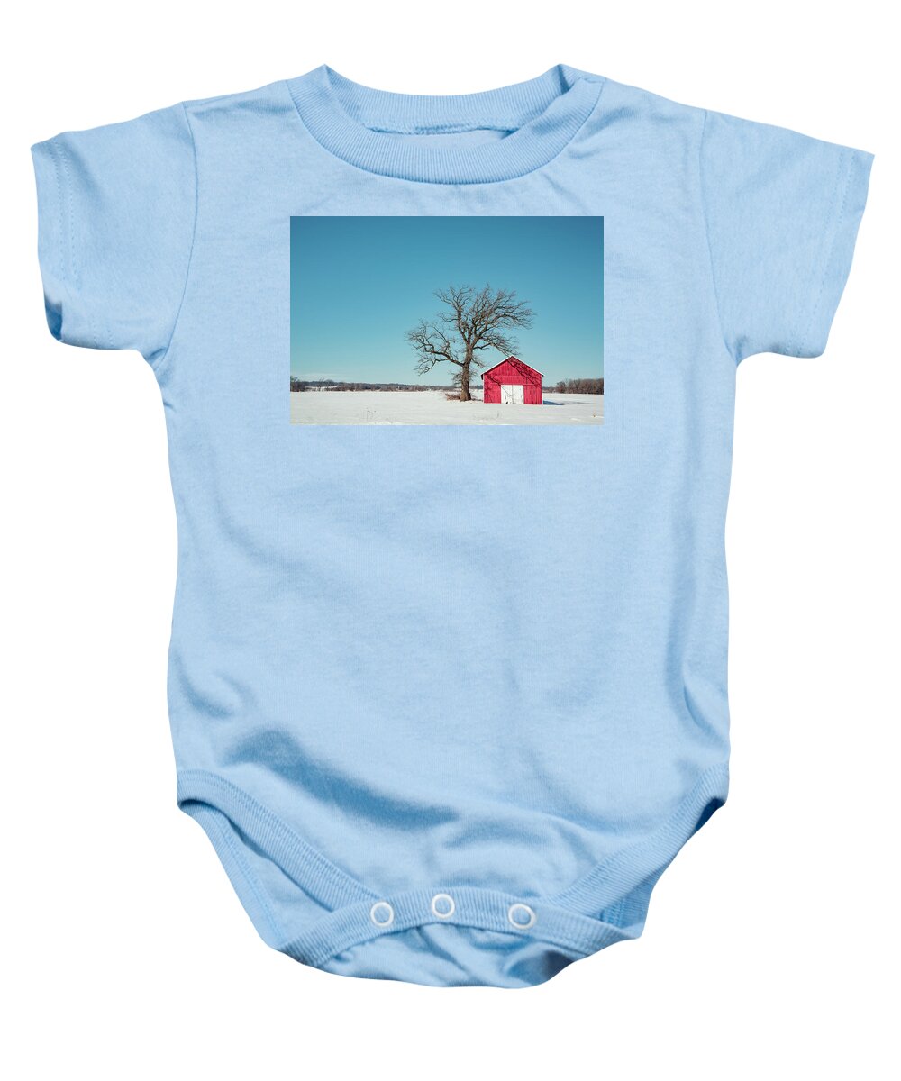 A Little Red Shed Is Nestled Beneath An Old Oak Tree On Snowy Wintry Scene. Baby Onesie featuring the photograph Little Red Shed by Todd Klassy