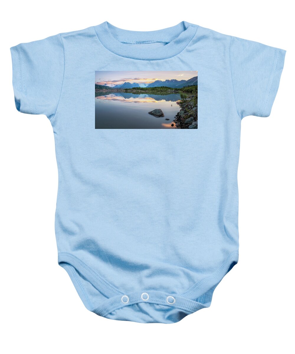 Alaska Baby Onesie featuring the photograph Morning at Wrangell Mountains with the water reflection by Alex Mironyuk