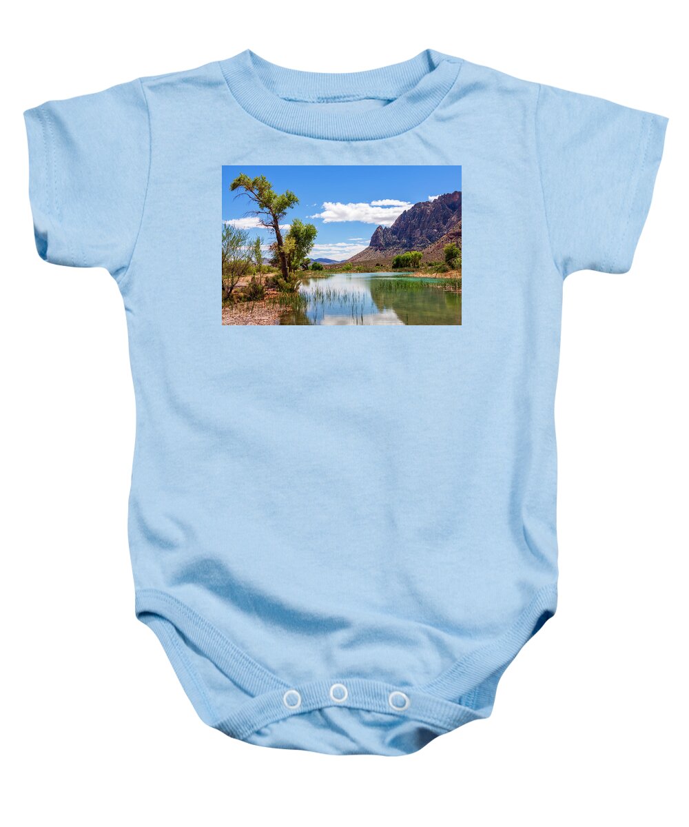 Pond Reflections Baby Onesie featuring the photograph Pond reflections in Mohave Desert, Nevada by Tatiana Travelways