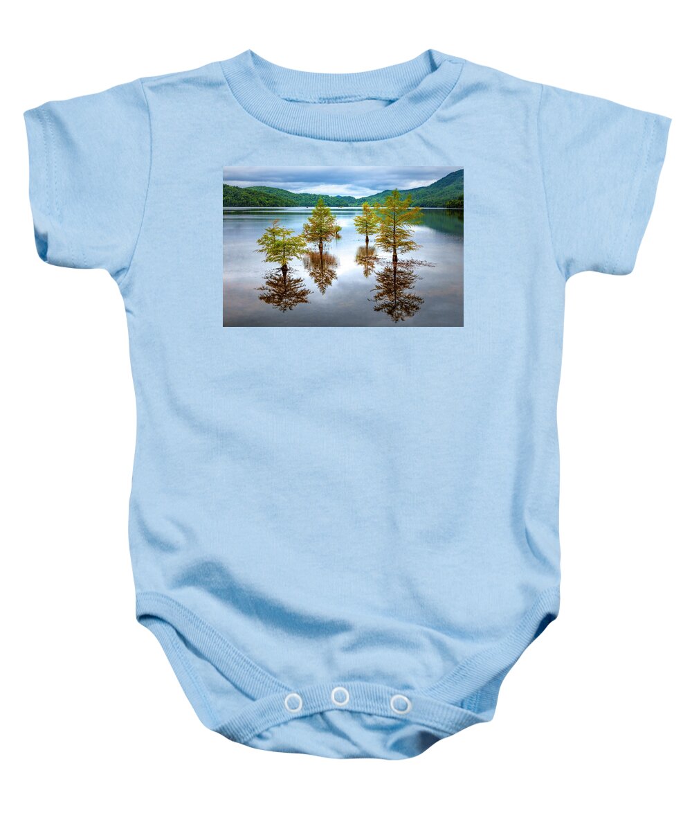 Benton Baby Onesie featuring the photograph Reflections of Trees by Debra and Dave Vanderlaan