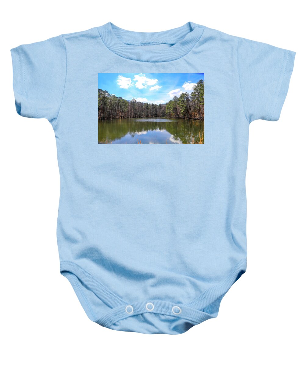Lake Baby Onesie featuring the photograph Silky Clouds Over Blue Sky at Sibley Pond by Marcus Jones