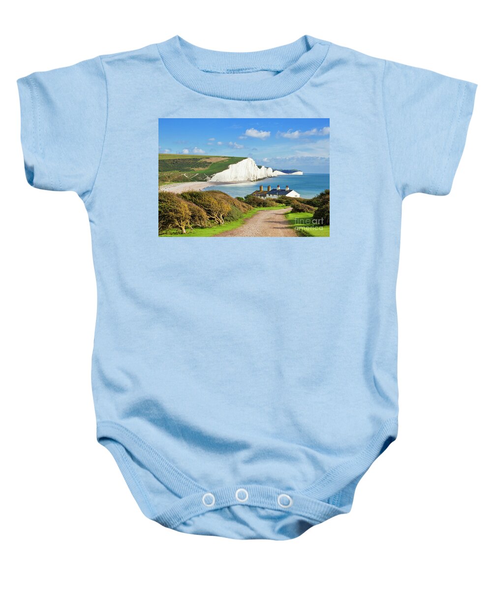 Seven Sisters Cliffs Baby Onesie featuring the photograph The Seven Sisters cliffs and coastguard cottages, South Downs, East Sussex, England by Neale And Judith Clark