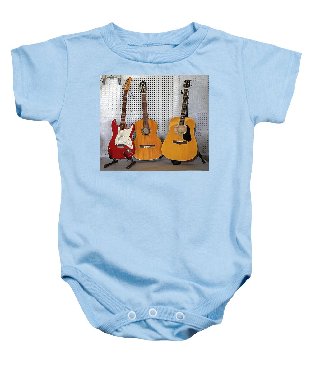 Guitar Baby Onesie featuring the photograph Three Guitars by Dart Humeston
