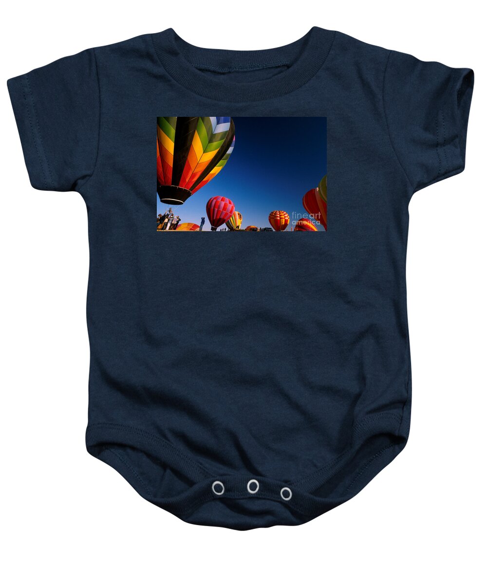 Hot Air Balloon Baby Onesie featuring the photograph Morning Launch by Jerry McElroy