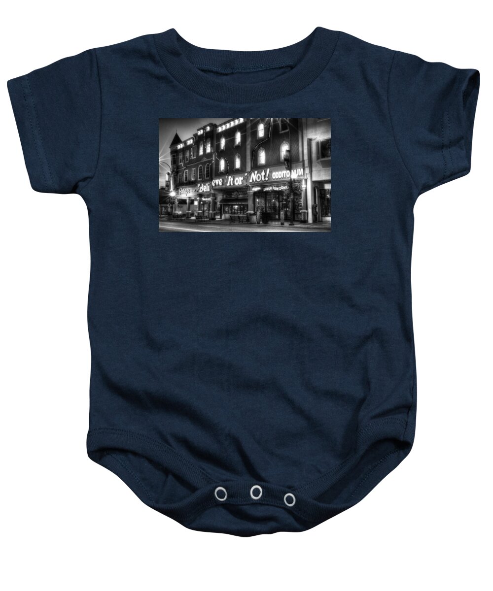 Ripley's Baby Onesie featuring the photograph Ripley's of Gatlinburg in Black and White by Greg and Chrystal Mimbs