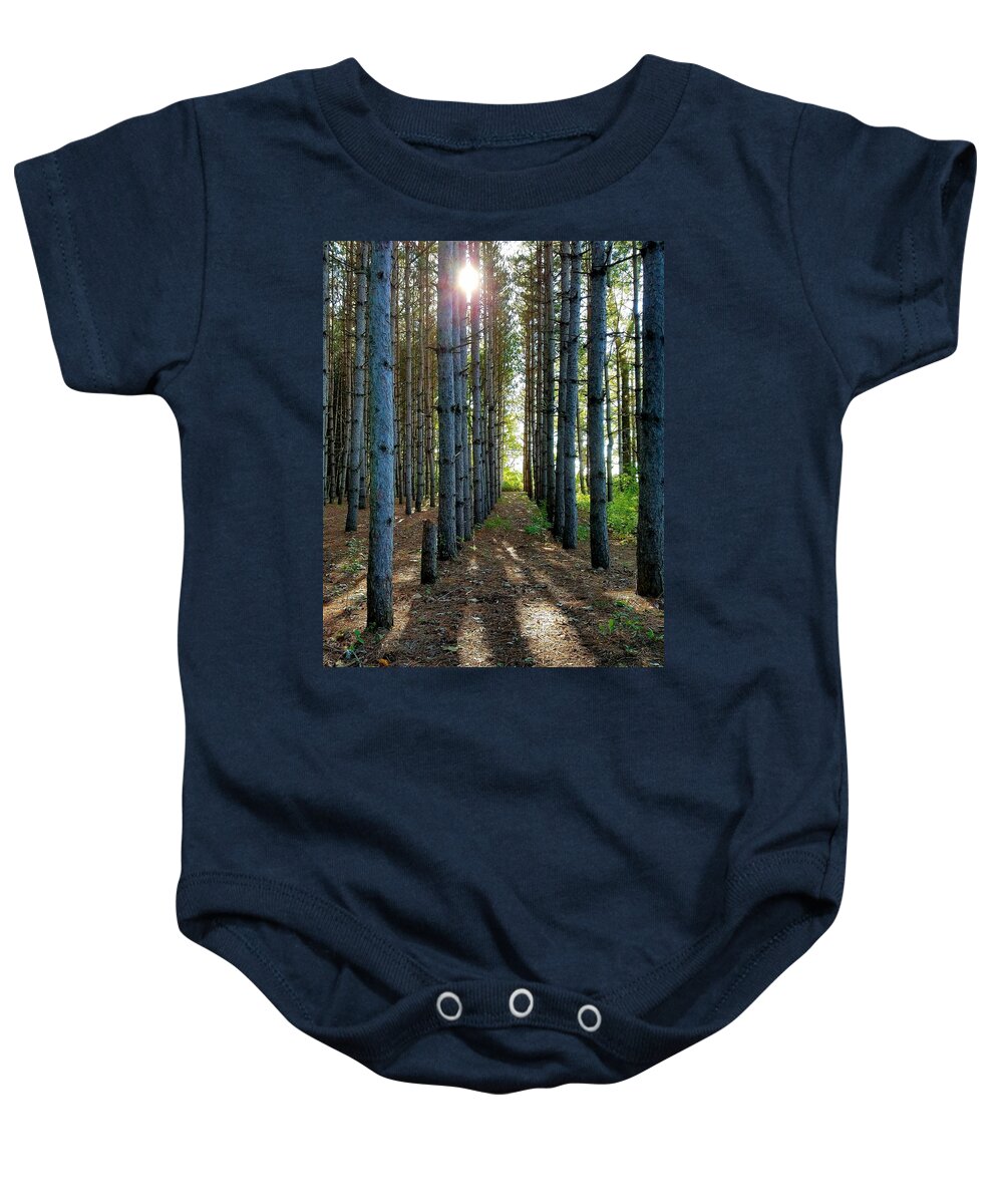 Sunlight Baby Onesie featuring the photograph Sunlight Through the Forest Trees by Vic Ritchey