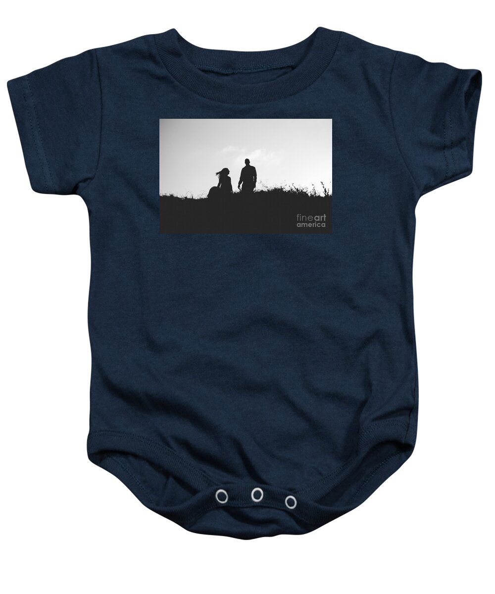 Abstract Baby Onesie featuring the photograph Silhouette of couple in love with wedding couple on top of a hil by Joaquin Corbalan