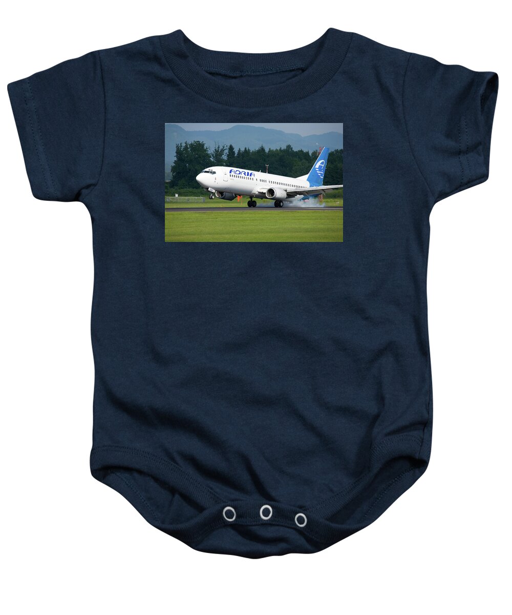 Adria Baby Onesie featuring the photograph Adria aircraft landing at Ljubljana Joze Pucnik Airport #1 by Ian Middleton