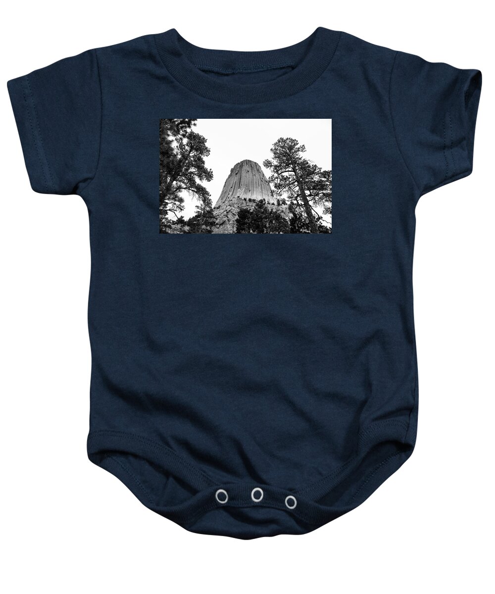 Devils Tower Long Exposure Baby Onesie featuring the photograph Devils Tower Black And White Base View by Dan Sproul