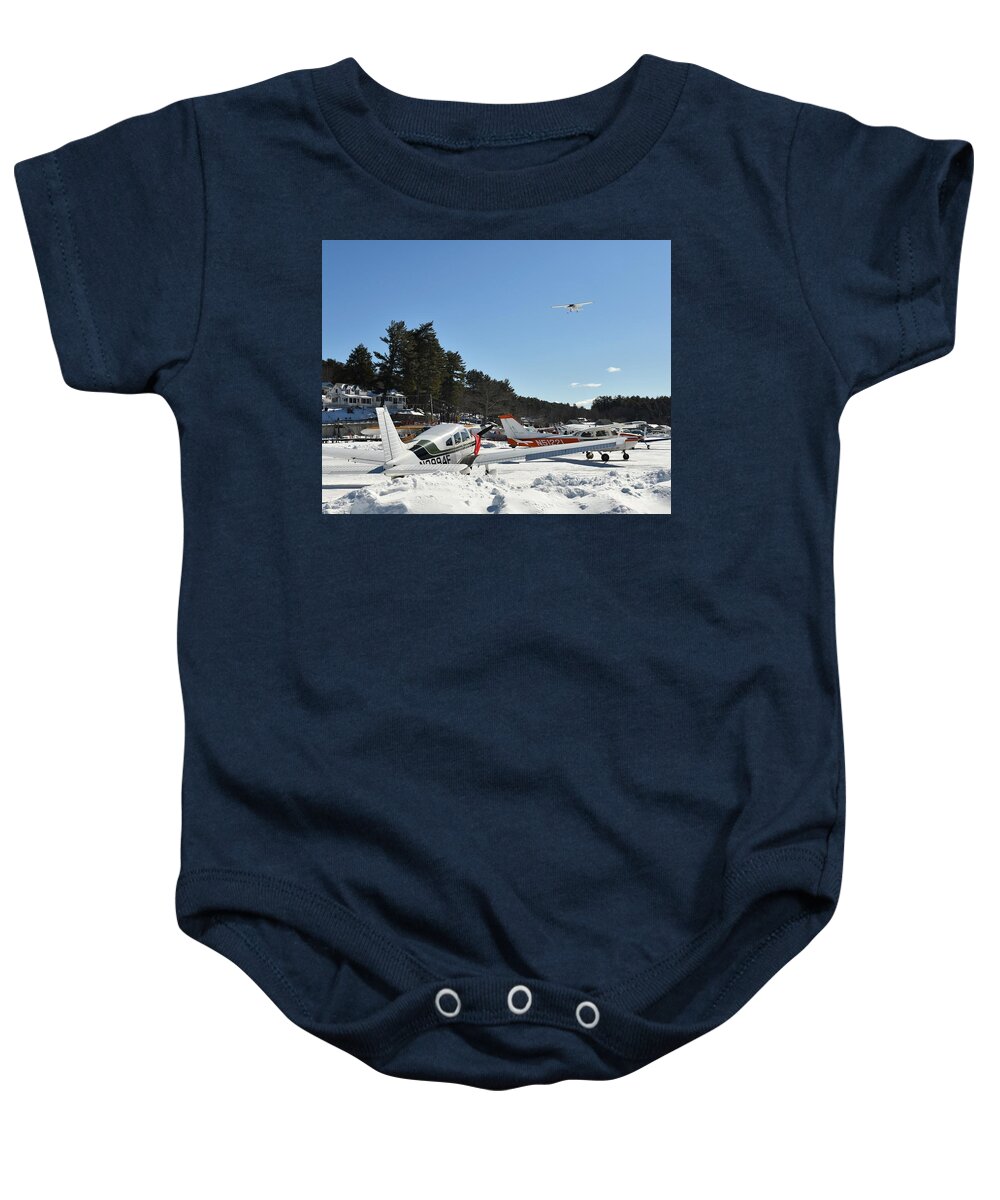 Ice Runway Baby Onesie featuring the photograph Flying Over the Big Lake by Steve Brown