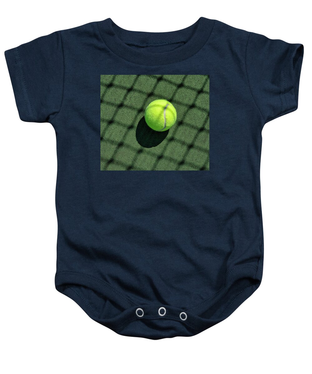 Tennis Baby Onesie featuring the photograph Net Shadows On Tennis Court And Tennis Ball by Gary Slawsky