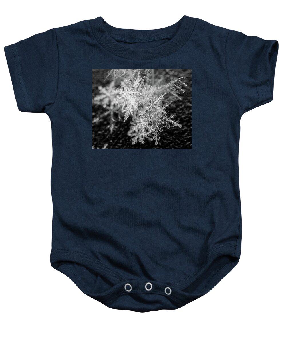 Snow Baby Onesie featuring the photograph Snowflake Pile Closeup Macro Winter Snow by Toby McGuire