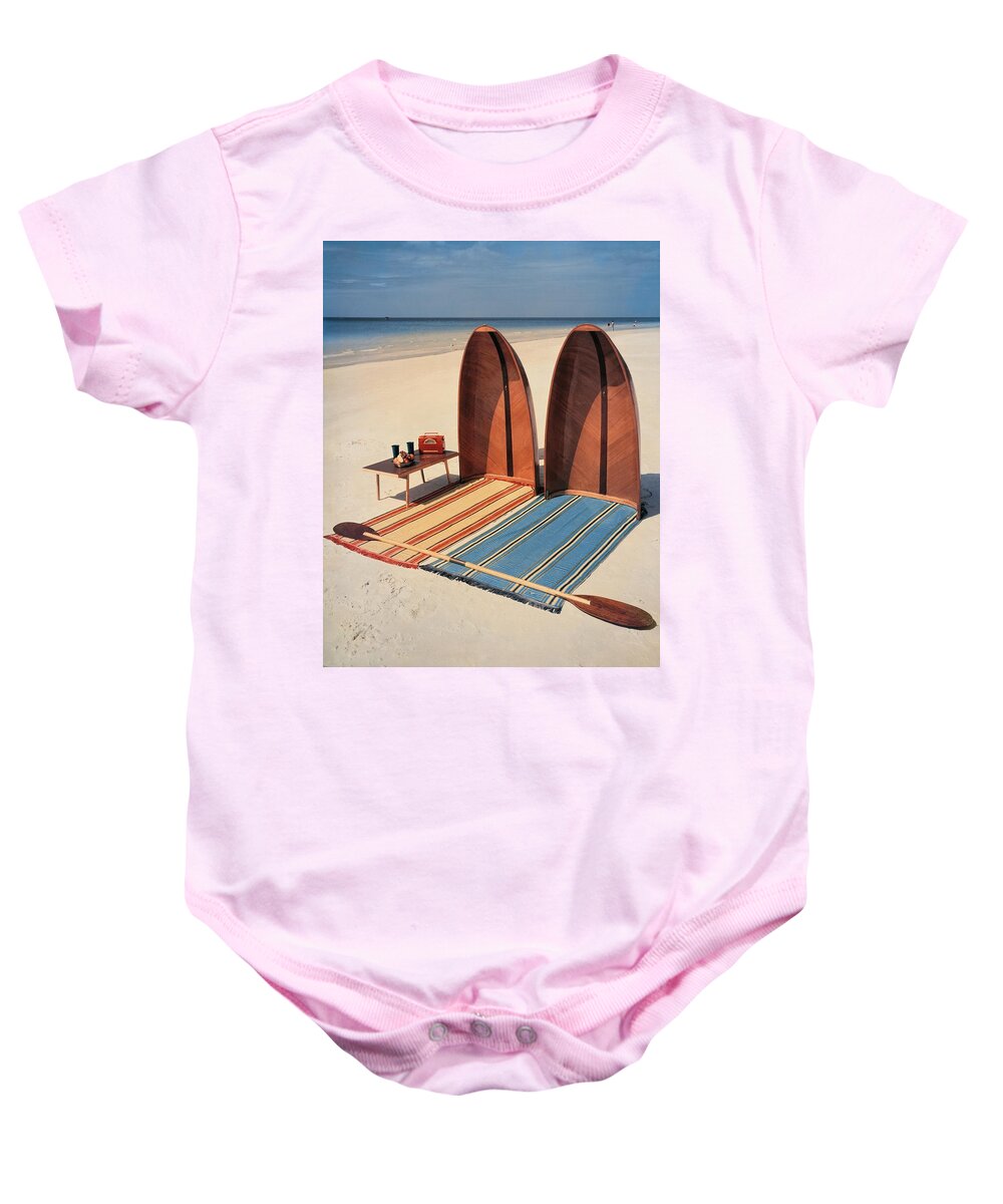 Accessories Baby Onesie featuring the photograph Pixie Collapsible Boat On The Beach by Lois and Joe Steinmetz