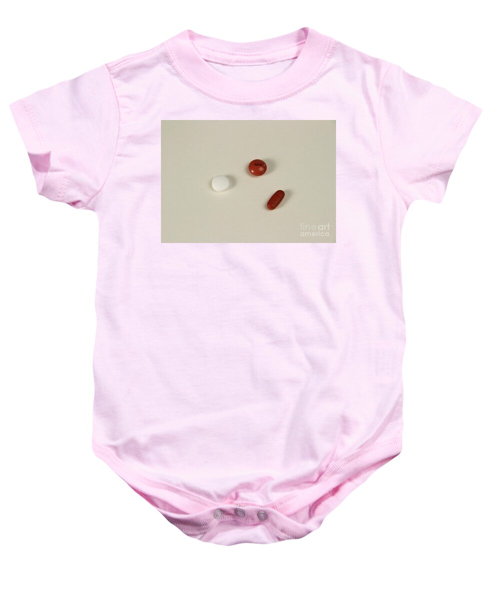 Drug Baby Onesie featuring the photograph Aspirin And Ibuprofen by Photo Researchers, Inc.