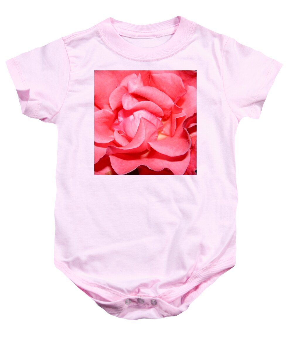Pink Baby Onesie featuring the photograph Delicate Swirls Of Pin by Kim Galluzzo