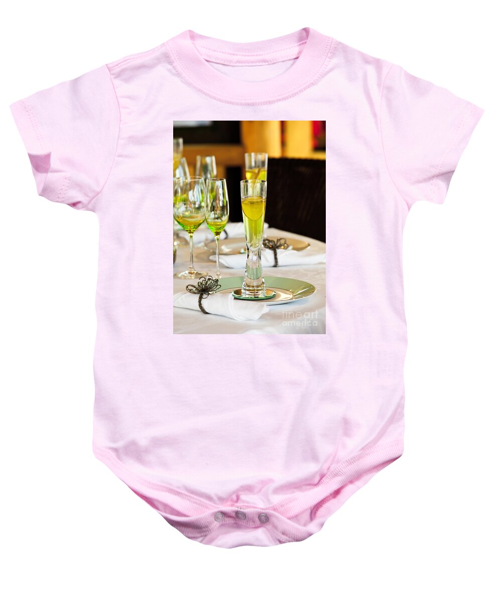 Stylish Dining Table Arrangement Close Up Baby Onesie featuring the photograph Stylish dining table arrangement by Simon Bratt