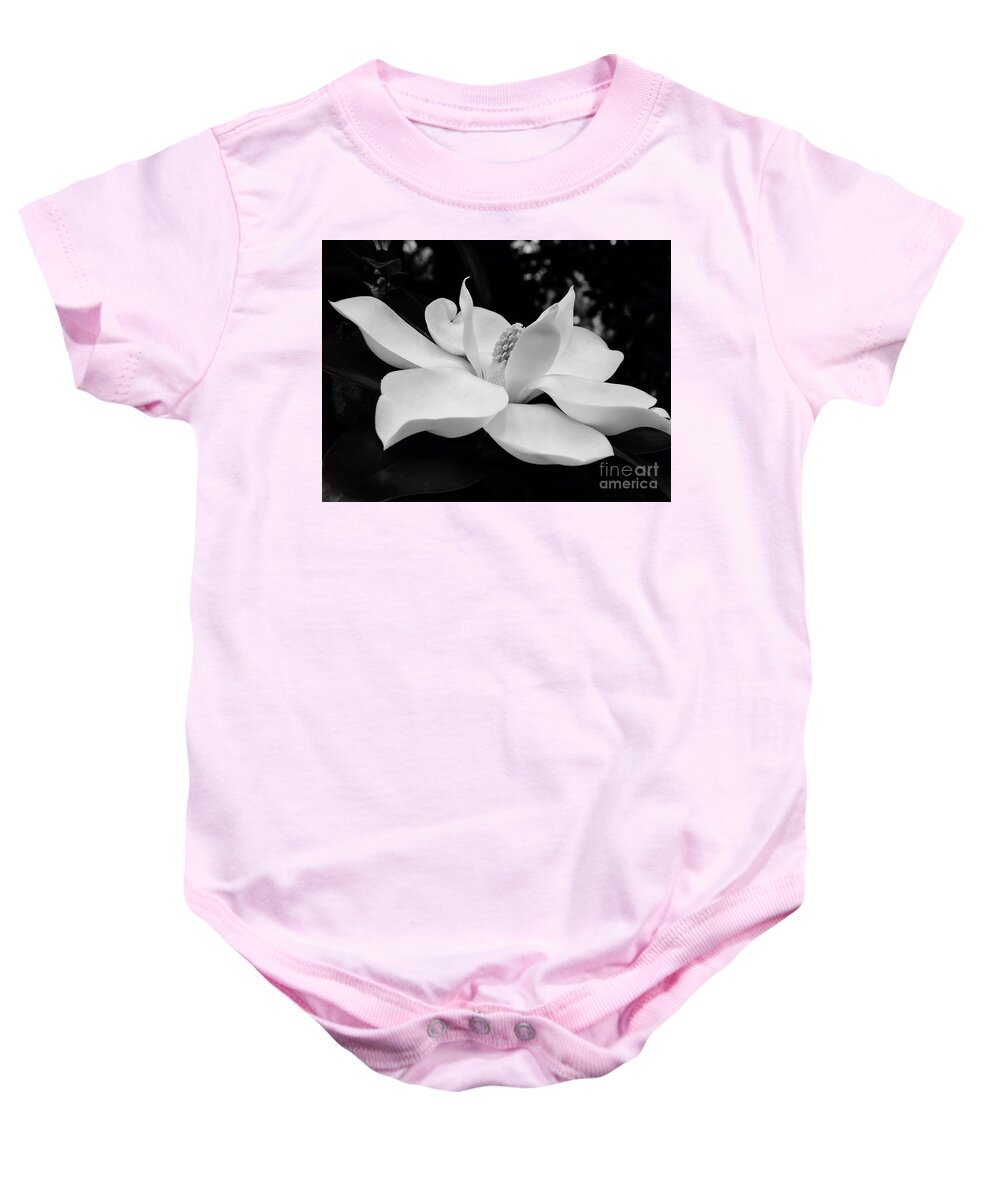 Magnolia Baby Onesie featuring the photograph B W Magnolia Blossom by D Hackett