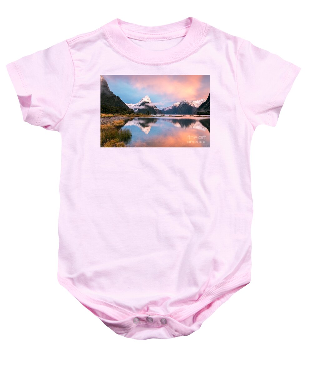 New Zealand Baby Onesie featuring the photograph Iconic view of Milford Sound at sunrise - New Zealand by Matteo Colombo