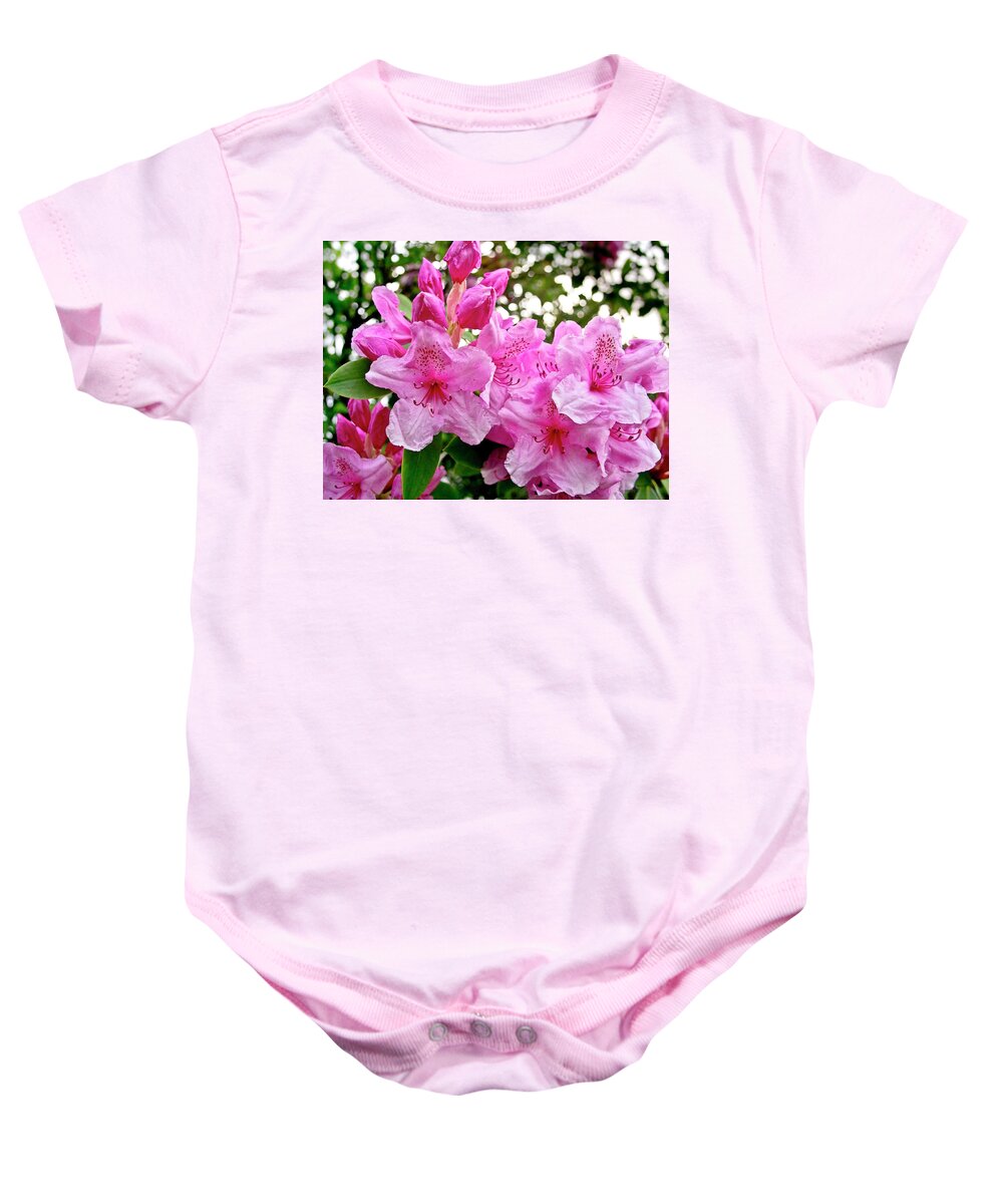 Lush Baby Onesie featuring the photograph Lush spring of the pink rhododendrons. by Elena Perelman