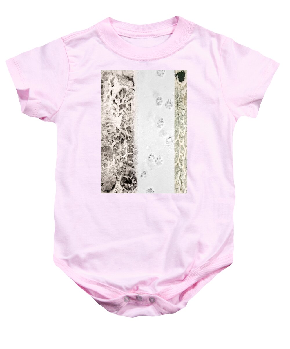 Winter Baby Onesie featuring the photograph Puppy Prints in the Snow by Lynn Hansen